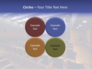 A Lecture Hall With Rows Of Chairs And A Projector Screen PowerPoint Template