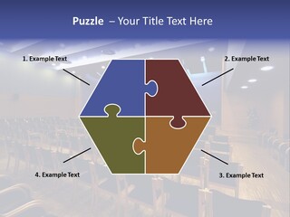 A Lecture Hall With Rows Of Chairs And A Projector Screen PowerPoint Template