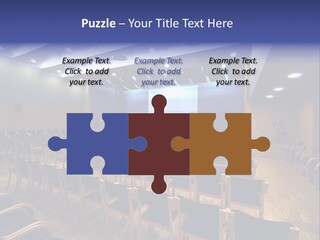 A Lecture Hall With Rows Of Chairs And A Projector Screen PowerPoint Template