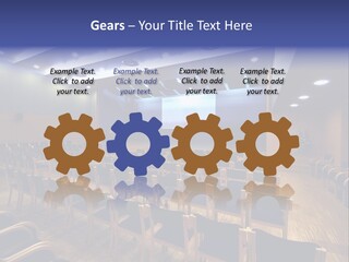 A Lecture Hall With Rows Of Chairs And A Projector Screen PowerPoint Template