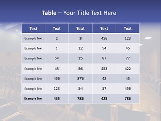 A Lecture Hall With Rows Of Chairs And A Projector Screen PowerPoint Template
