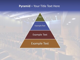 A Lecture Hall With Rows Of Chairs And A Projector Screen PowerPoint Template