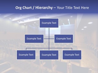 A Lecture Hall With Rows Of Chairs And A Projector Screen PowerPoint Template