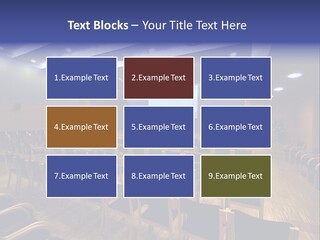 A Lecture Hall With Rows Of Chairs And A Projector Screen PowerPoint Template