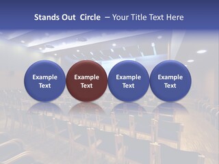 A Lecture Hall With Rows Of Chairs And A Projector Screen PowerPoint Template