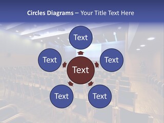 A Lecture Hall With Rows Of Chairs And A Projector Screen PowerPoint Template