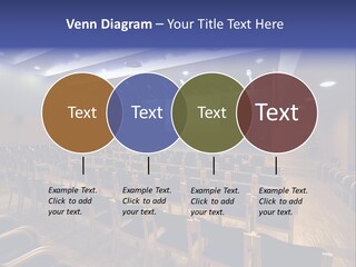 A Lecture Hall With Rows Of Chairs And A Projector Screen PowerPoint Template