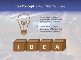 A Lecture Hall With Rows Of Chairs And A Projector Screen PowerPoint Template