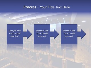 A Lecture Hall With Rows Of Chairs And A Projector Screen PowerPoint Template