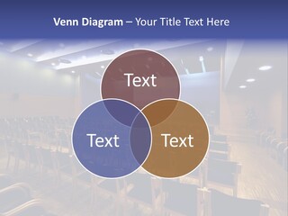 A Lecture Hall With Rows Of Chairs And A Projector Screen PowerPoint Template