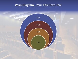 A Lecture Hall With Rows Of Chairs And A Projector Screen PowerPoint Template
