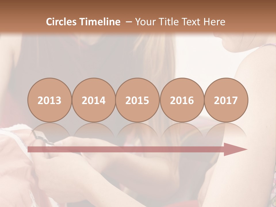 Two Women Sitting On A Couch Looking At A Piece Of Clothing PowerPoint Template