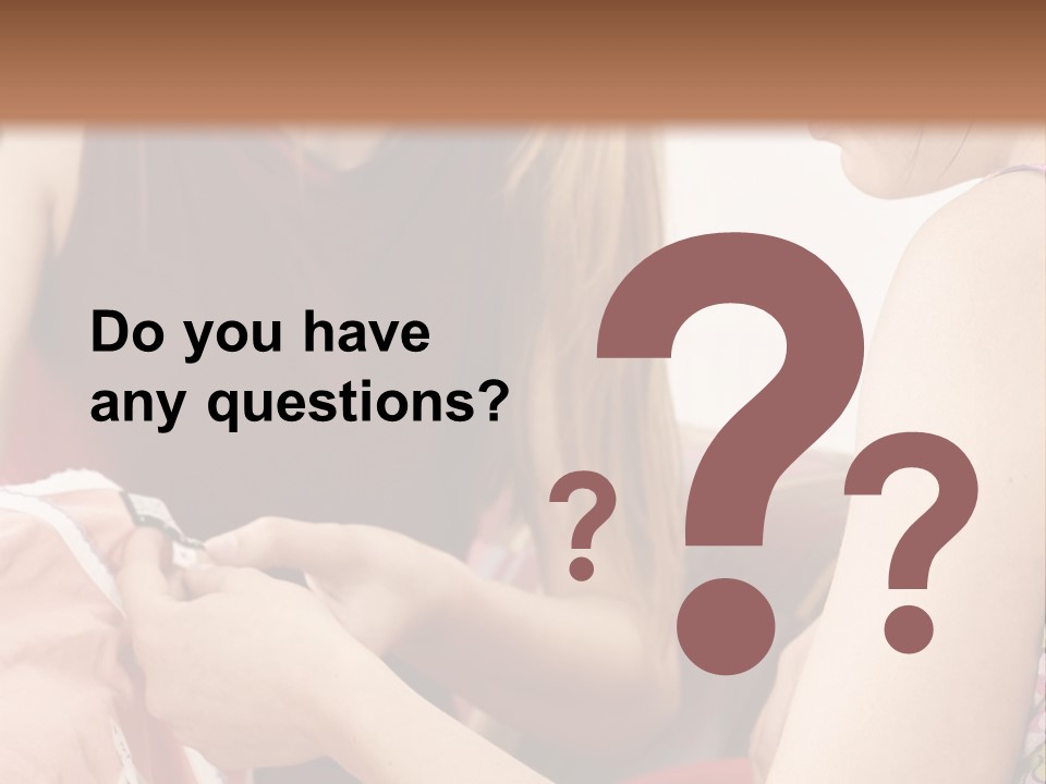 Two Women Sitting On A Couch Looking At A Piece Of Clothing PowerPoint Template