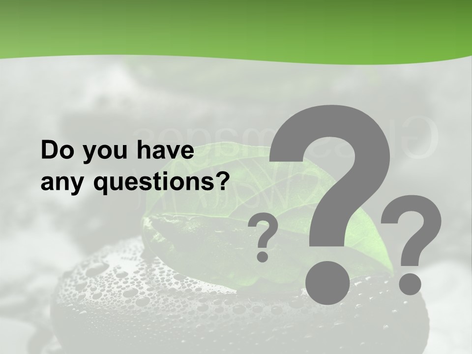 A Group Of Rocks With Green Leaves On Them PowerPoint Template