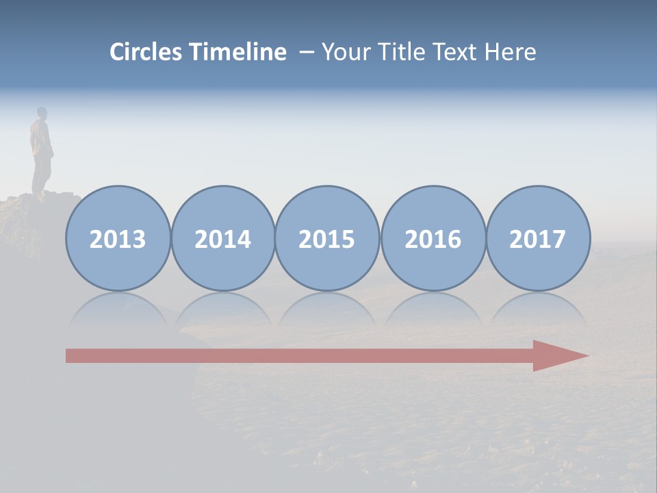 A Man Standing On Top Of A Large Rock PowerPoint Template