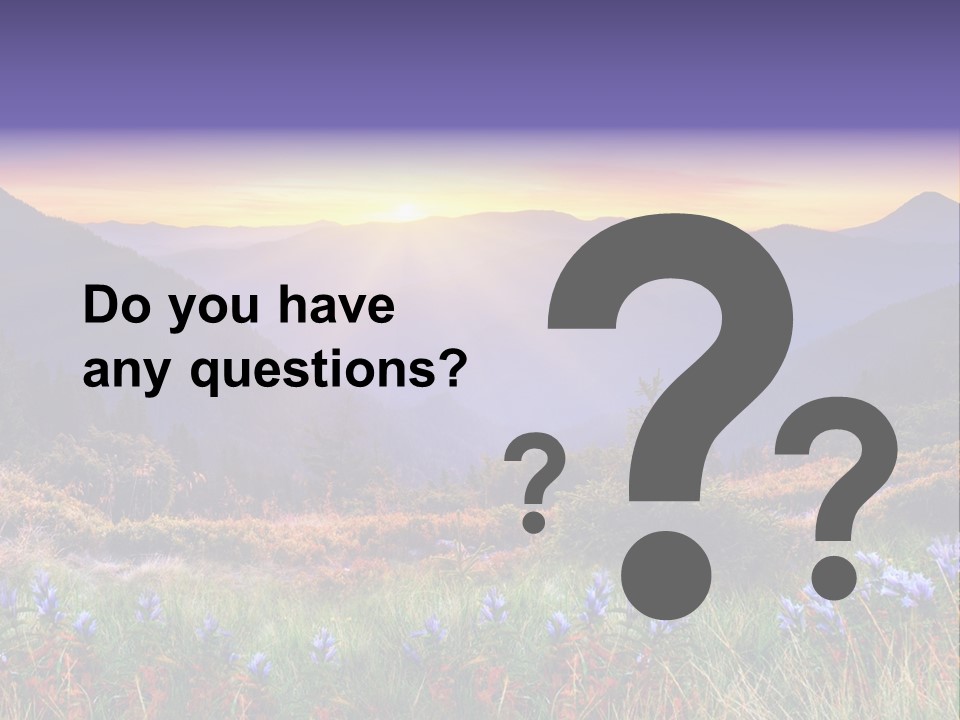 A Beautiful Sunset Over A Mountain Range With Wildflowers PowerPoint Template