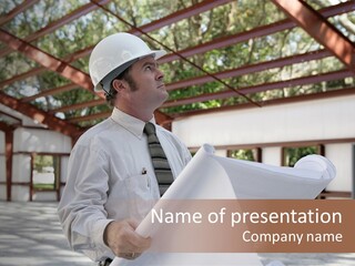 A Man In A Hard Hat Is Holding A Blueprint PowerPoint Template