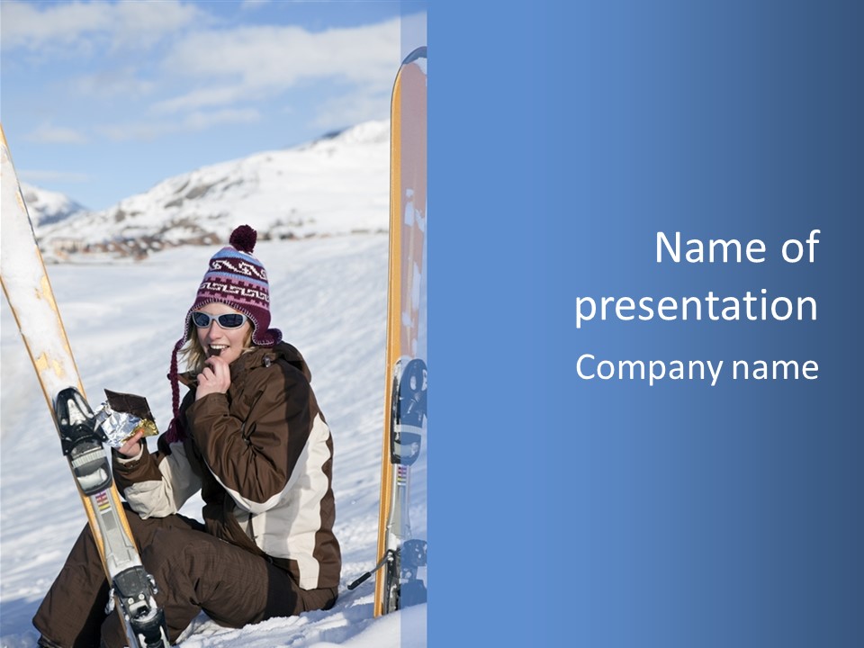 A Woman Sitting In The Snow With Skis On Her Feet PowerPoint Template