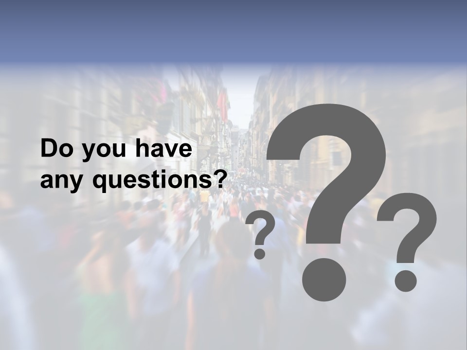 A Large Group Of People Walking Down A Street PowerPoint Template