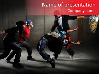 A Group Of Young Men Dancing In A Dance Studio PowerPoint Template