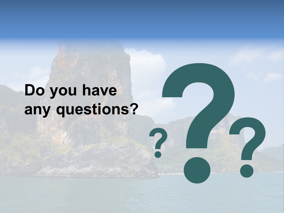 A Large Body Of Water With Mountains In The Background PowerPoint Template