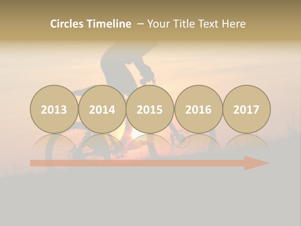 A Silhouette Of A Person Riding A Bike At Sunset PowerPoint Template