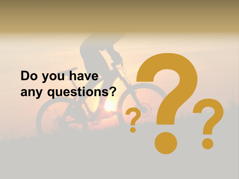 A Silhouette Of A Person Riding A Bike At Sunset PowerPoint Template