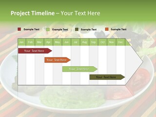 A White Plate Topped With A Salad Covered In Cheese PowerPoint Template