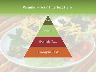 A White Plate Topped With A Salad Covered In Cheese PowerPoint Template