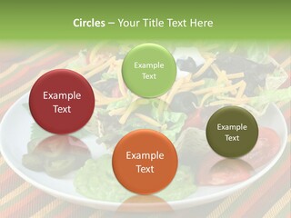 A White Plate Topped With A Salad Covered In Cheese PowerPoint Template
