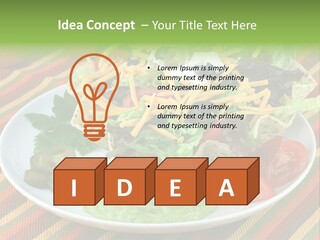 A White Plate Topped With A Salad Covered In Cheese PowerPoint Template