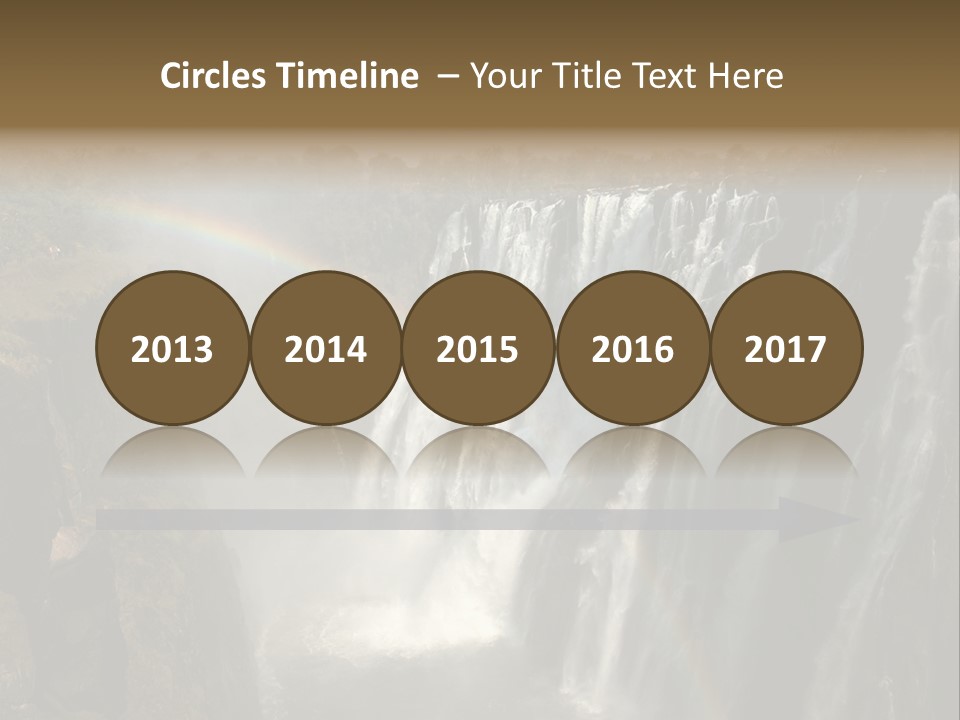 A Waterfall With A Rainbow In The Middle Of It PowerPoint Template