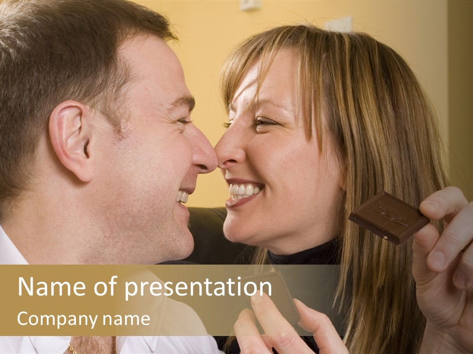 A Man And A Woman Eating A Chocolate Bar PowerPoint Template