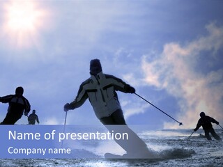 A Group Of People Riding Skis On Top Of A Snow Covered Slope PowerPoint Template