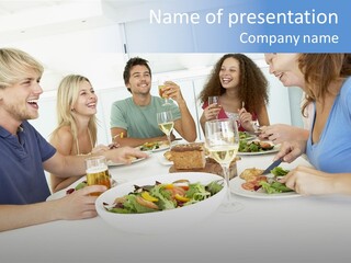 A Group Of People Sitting Around A Table Eating Food PowerPoint Template