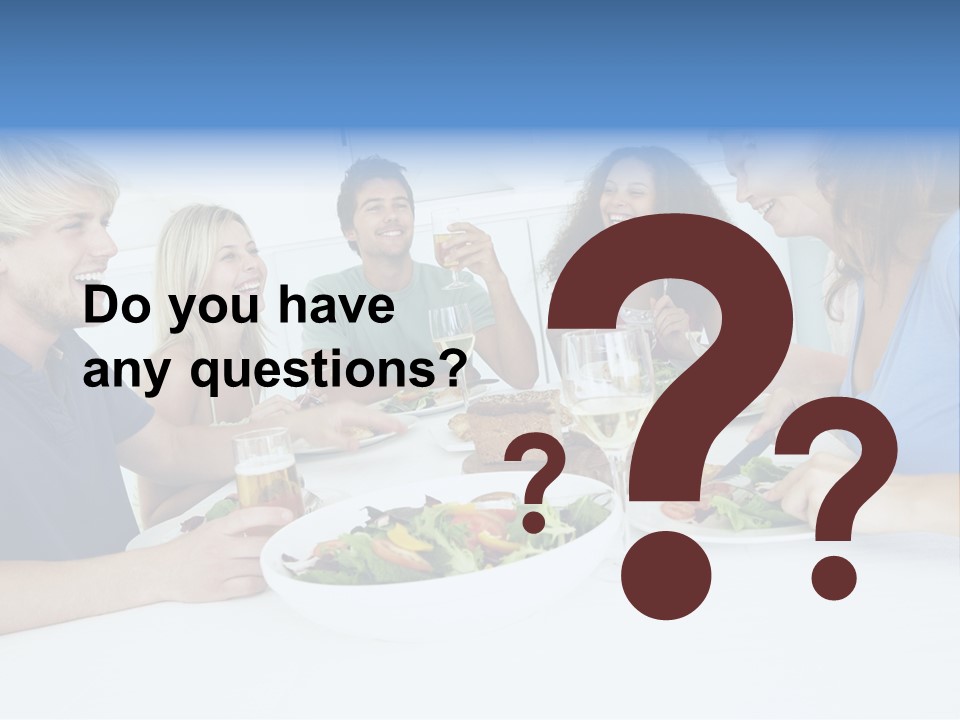 A Group Of People Sitting Around A Table Eating Food PowerPoint Template