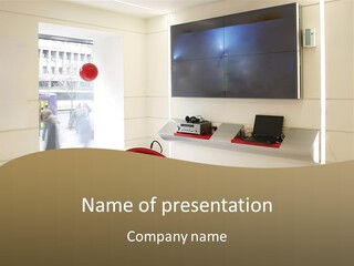 A Room With A Large Screen And A Laptop PowerPoint Template