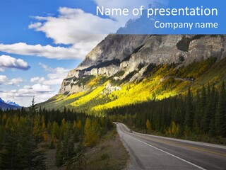 A Road With A Mountain In The Background PowerPoint Template