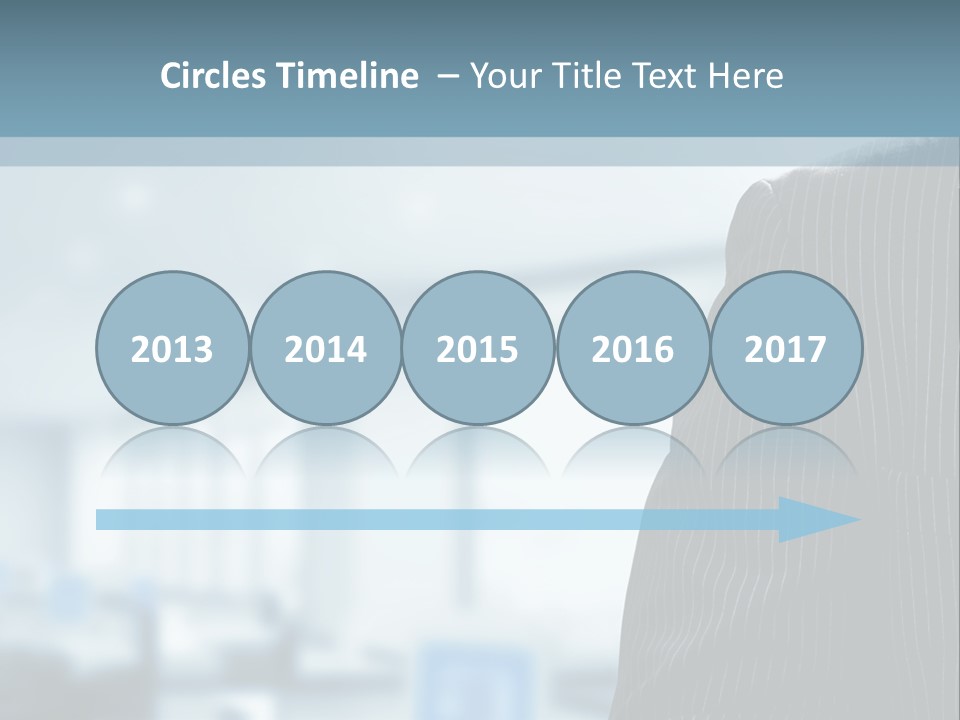 A Man In A Suit And Tie Standing In A Room PowerPoint Template