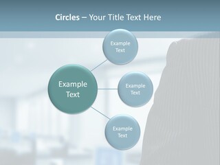 A Man In A Suit And Tie Standing In A Room PowerPoint Template