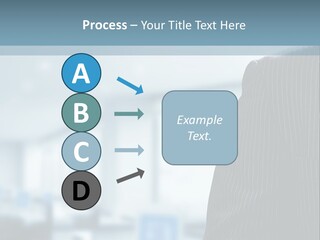 A Man In A Suit And Tie Standing In A Room PowerPoint Template