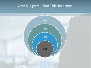 A Man In A Suit And Tie Standing In A Room PowerPoint Template
