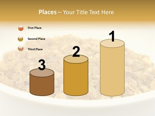 A White Bowl Filled With Cereal On Top Of A Table PowerPoint Template