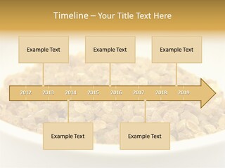 A White Bowl Filled With Cereal On Top Of A Table PowerPoint Template