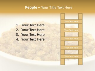 A White Bowl Filled With Cereal On Top Of A Table PowerPoint Template