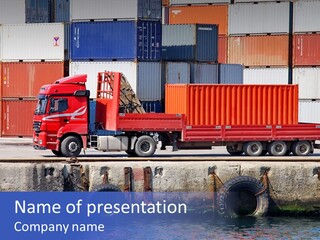 A Red Truck Is Parked Next To A Body Of Water PowerPoint Template