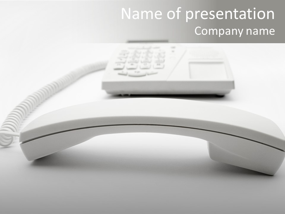 A White Telephone Sitting On Top Of A Table PowerPoint Template