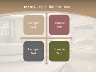 A Large Room With A Counter And Chairs PowerPoint Template
