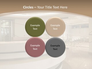 A Large Room With A Counter And Chairs PowerPoint Template