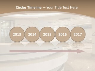 A Large Room With A Counter And Chairs PowerPoint Template